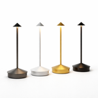 Four portable lamps in different colors on a white background