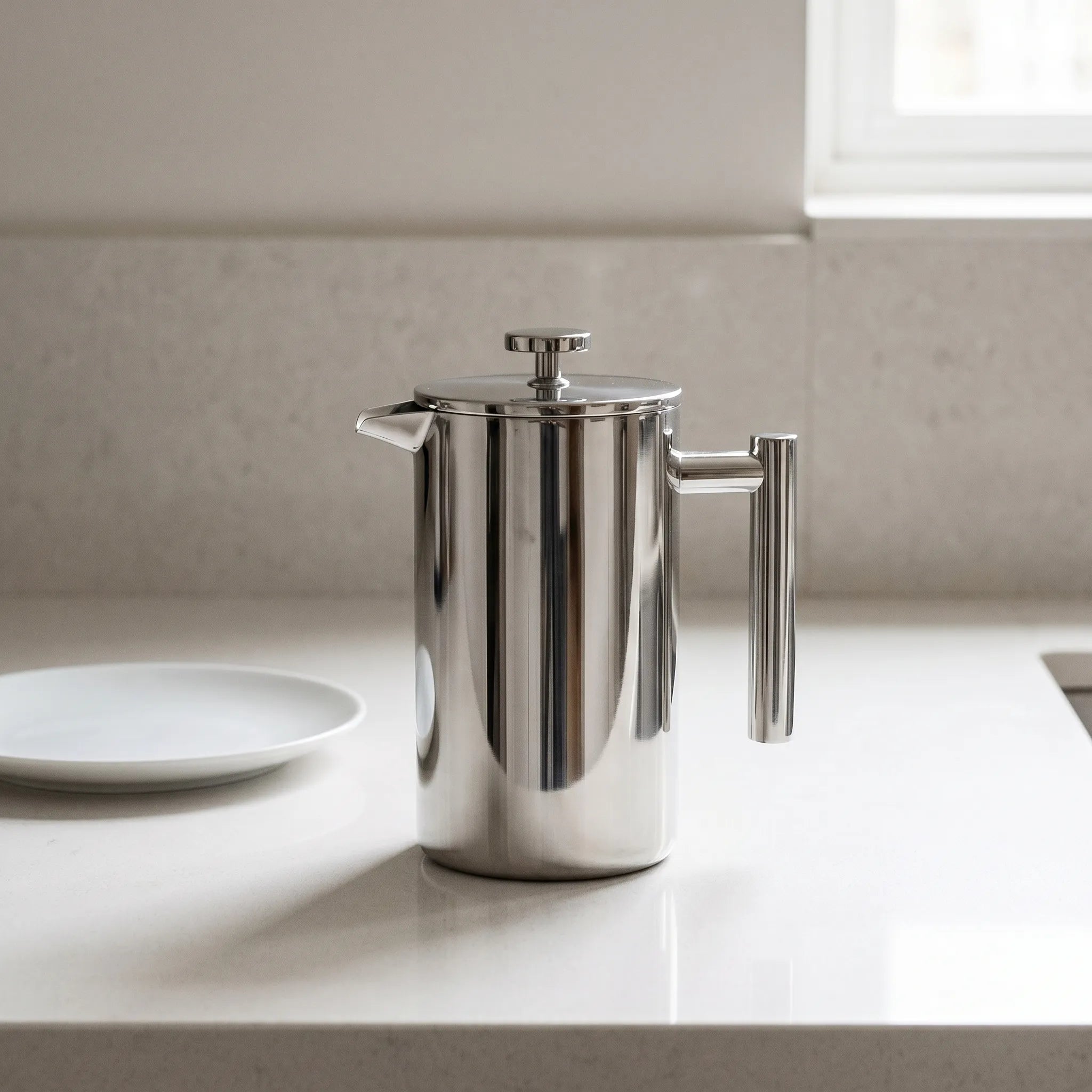 Double Wall Stainless Steel French Press – Mirror Finish in a nice kitchen. 