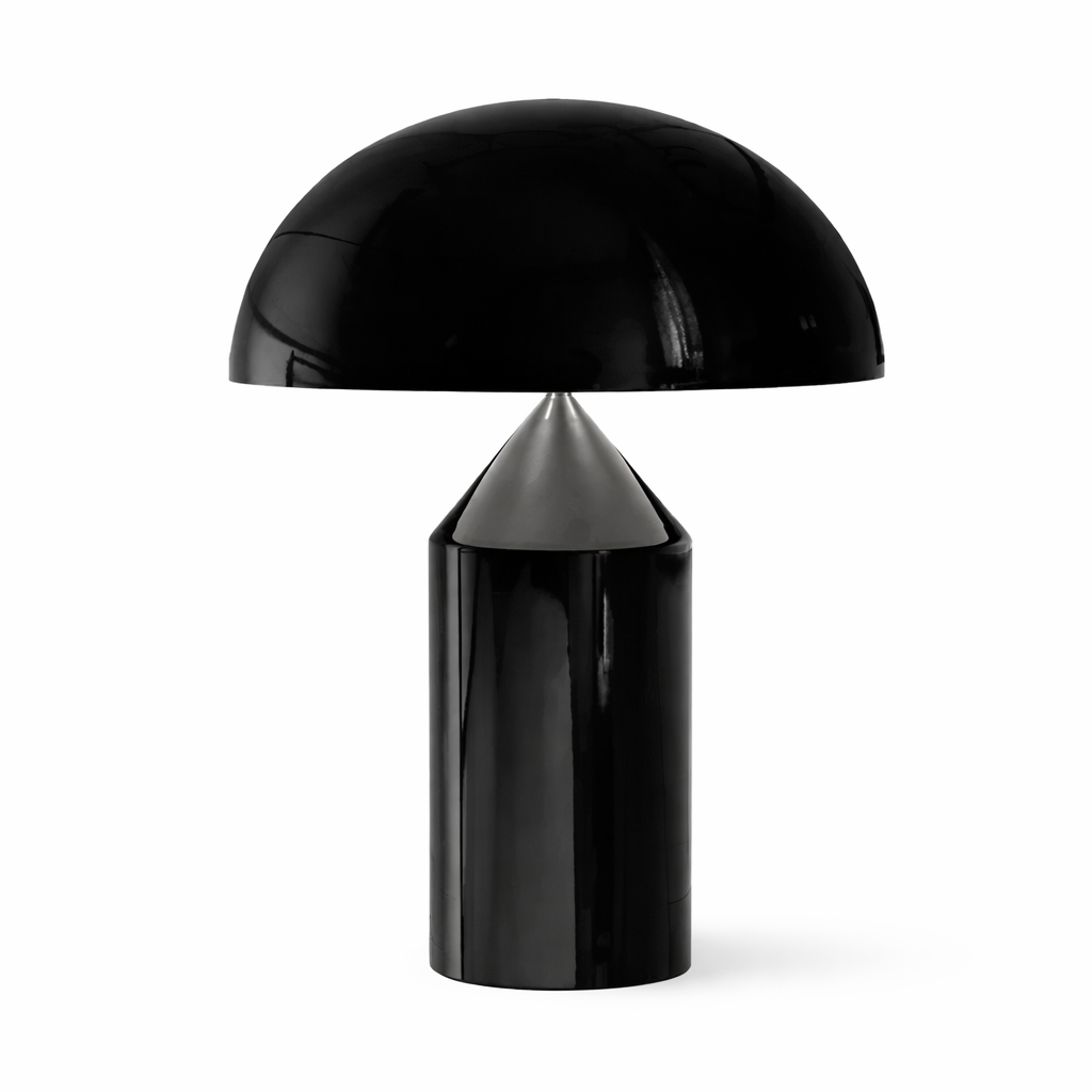 Black table lamp with a dome-shaped shade on a white background