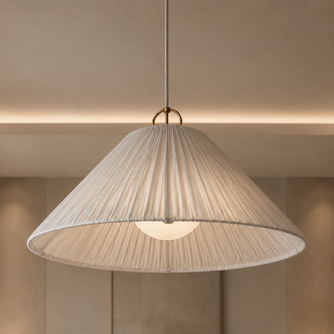 Modern pendant light hanging in a bedroom with neutral tones