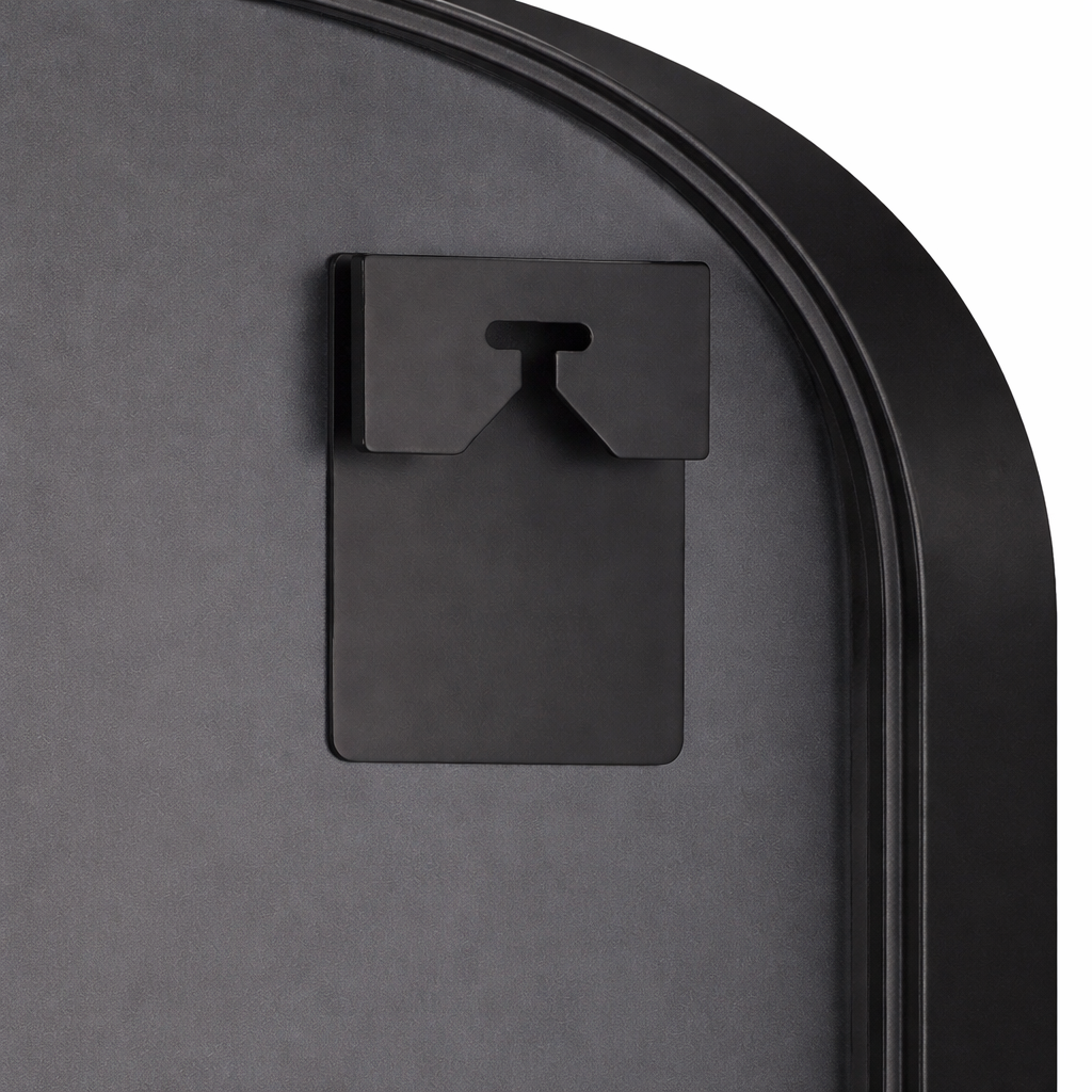 Black metal bracket on a gray wall