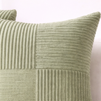 Close-up of a textured green pillow on a light background