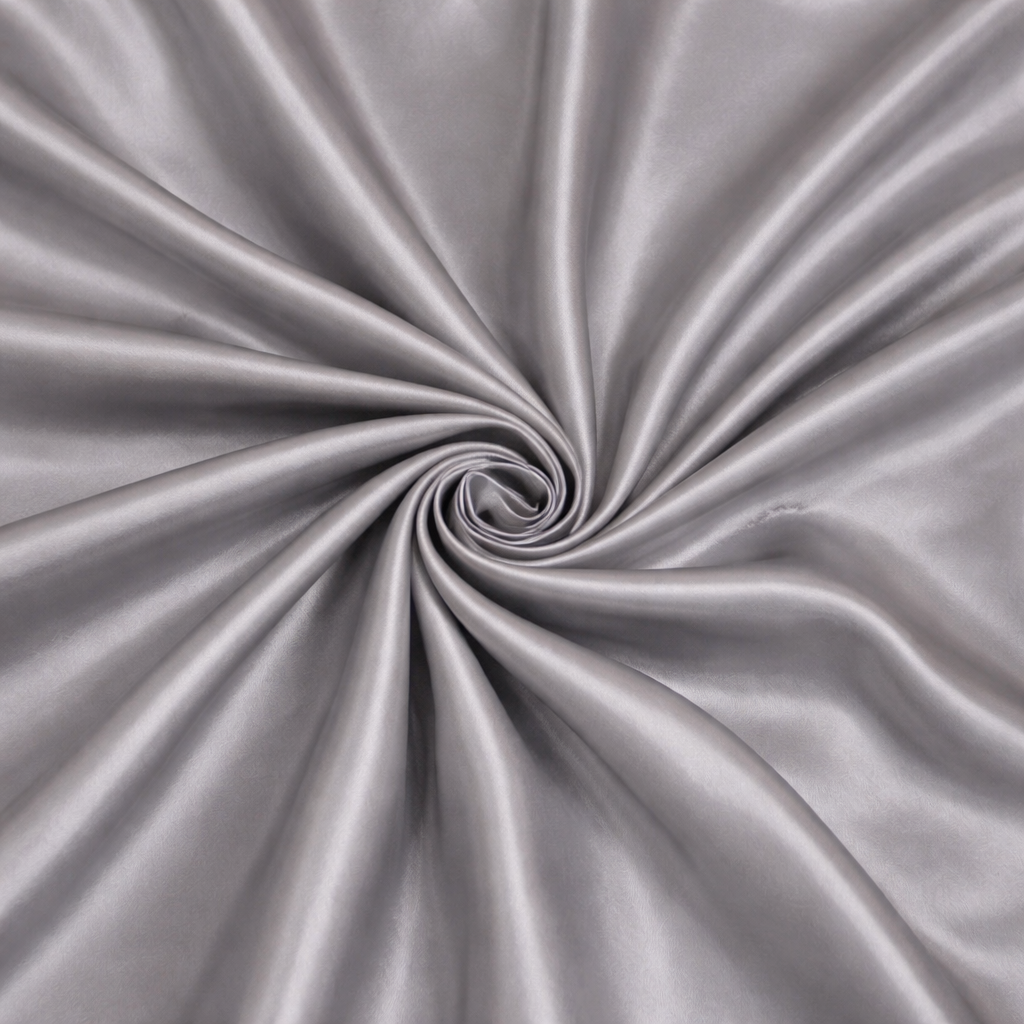 Close-up of gray fabric with a swirl pattern