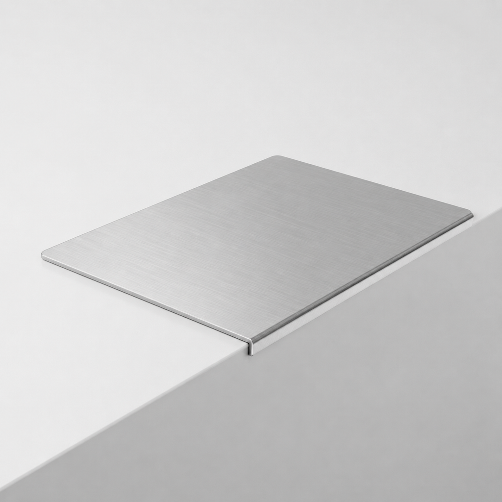 Metallic square object on a light gray background