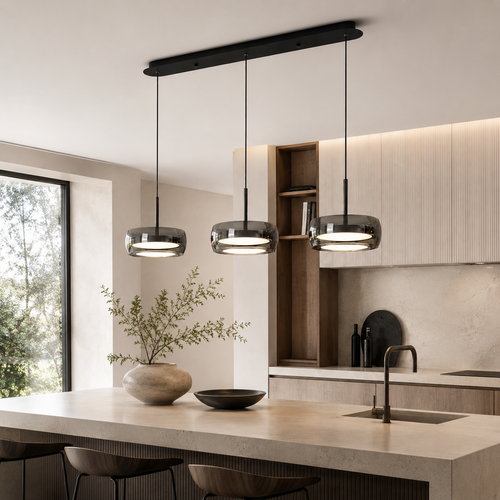 Modern tripple lamp chandelier with tinted glass lamps in a nice modern kitchen.