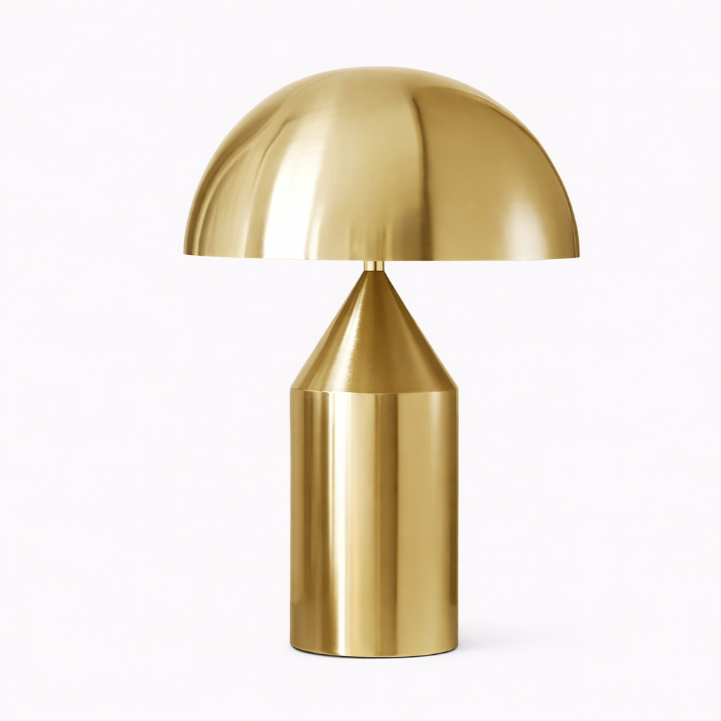 Gold table lamp on a white background