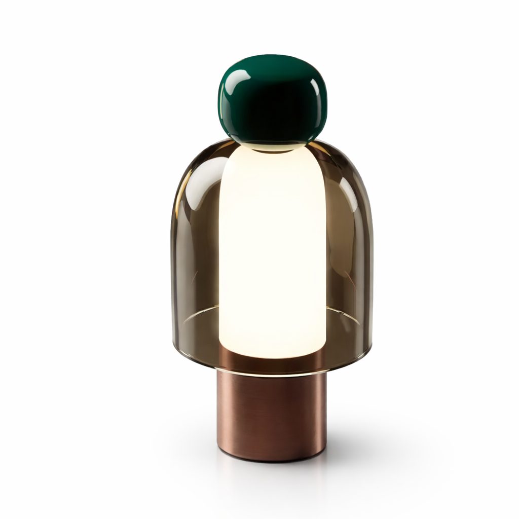 Modern table lamp with a green top and bronze base on a white background
