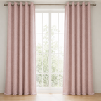 Pink curtains hanging in front of a window with a light background