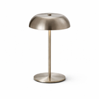 Modern table lamp with metallic finish on a white background