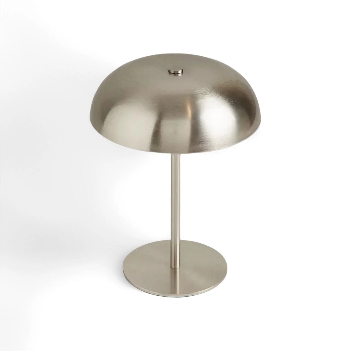 Metallic table lamp on a white background