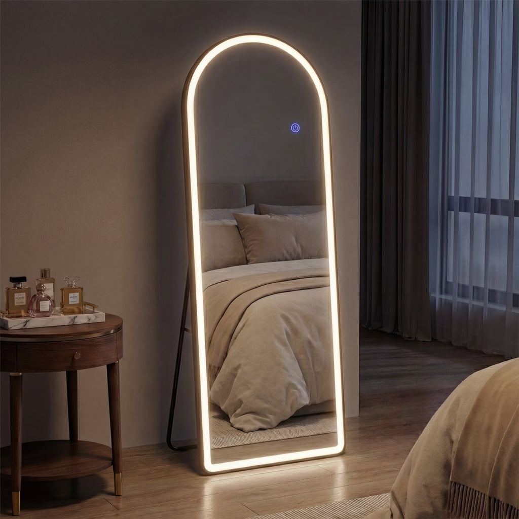 Modern standing mirror with LED lighting in a bedroom setting