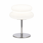 Modern table lamp with white shade and chrome base on a white background