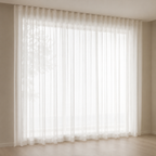 Sheer white curtains in a room with beige walls and floor.