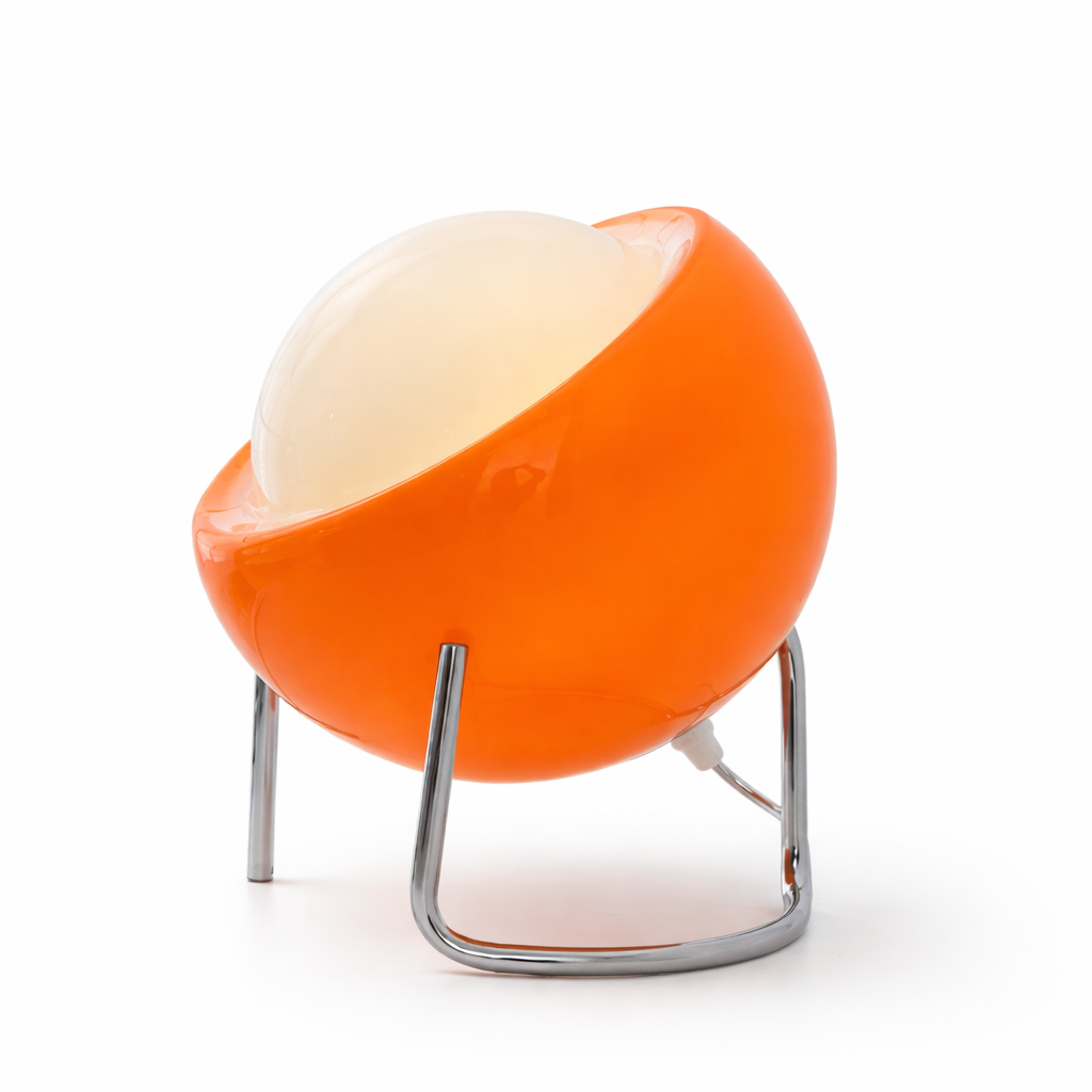 Orange and white chair with a metal base on a white background